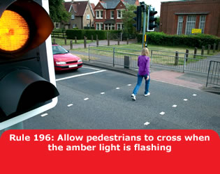 Allow pedestrians to cross when the amber light is flashing