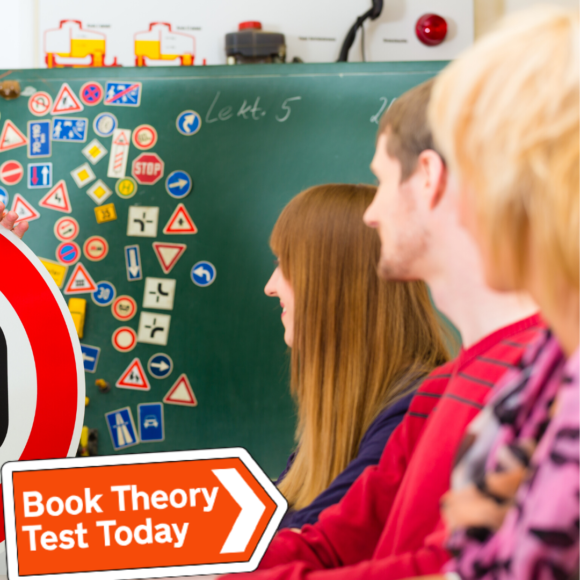 Learner drivers doing theory test revision.